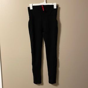 Spanx black leggings with stitch detail and back zip pocket
